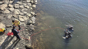 SUV Plunges into Reservoir at Dawn; One Occupant Found Dead