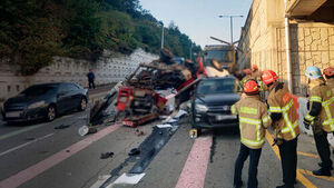 Ladder Truck Plunges from Overpass After Being Hit; 3 Casualties