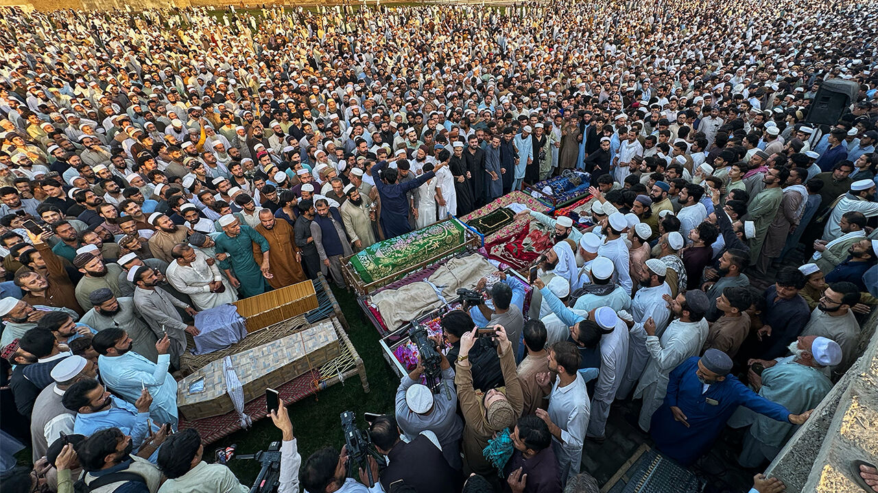 Pakistanis gathered for a funeral prayer service for victims of the school roof collapse accident