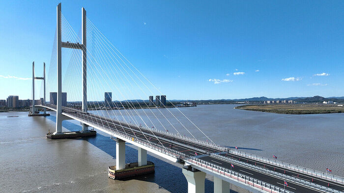 North Korea's Korean Central News Agency reported on October 16 that 'amid the expectations and interest of the governments and peoples of the two countries of the DPRK and China, the opening ceremony of the DPRK-China Yalu River Bridge was held on-site on October 15.' (Photo: KCNA, Yonhap News)