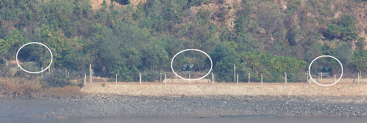 North Korean self-propelled artillery guns face south in the coastal border area of Kaepung County, Hwanghae Province, North Korea, as seen from the Aegibong Observatory in Gimpo, Gyeonggi Province, on October 25.