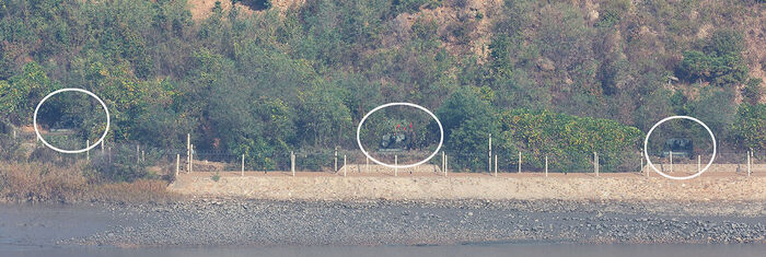 North Korean self-propelled artillery guns face south in the coastal border area of Kaepung County, Hwanghae Province, North Korea, as seen from the Aegibong Observatory in Gimpo, Gyeonggi Province, on October 25.