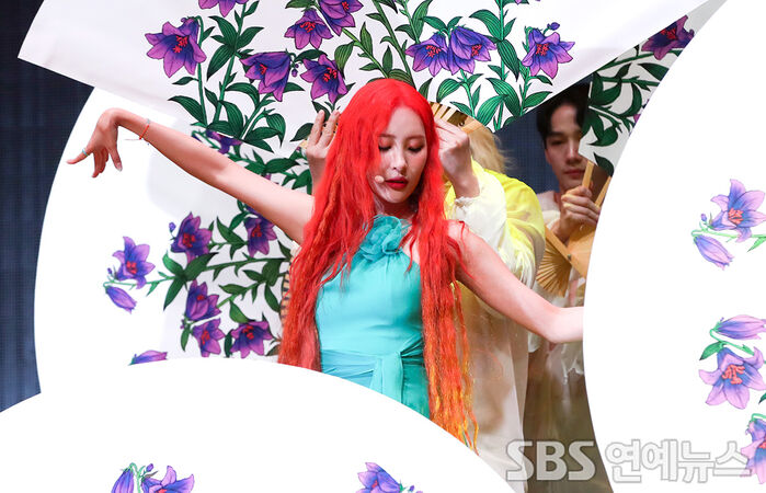 Sunmi onstage at the Heart Burn media showcase in Seoul