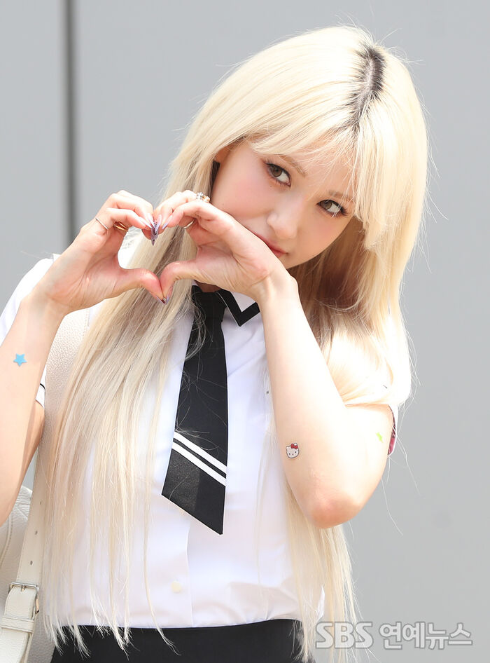 [Throwback] Jeon Somi Channels Real-Life Barbie With a Sweet Heart Pose
