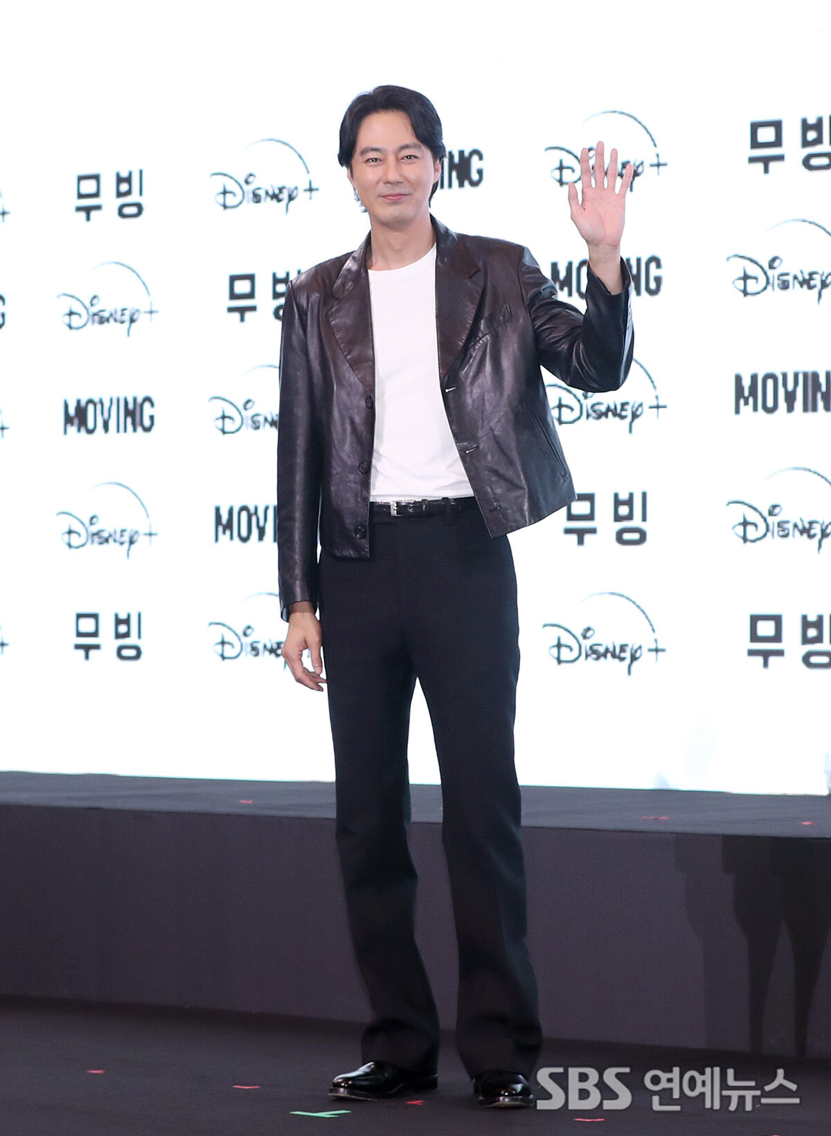 Jo In-sung shares a smile at the Moving press event