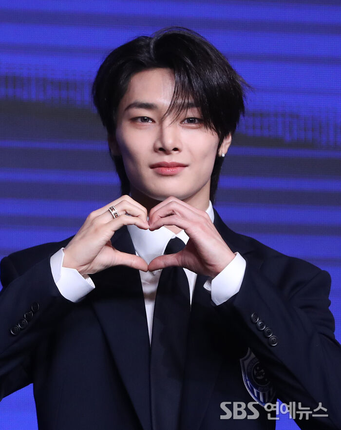 Stray Kids' I.N Flashes a Heart Pose at 'KARMA' Press Conference