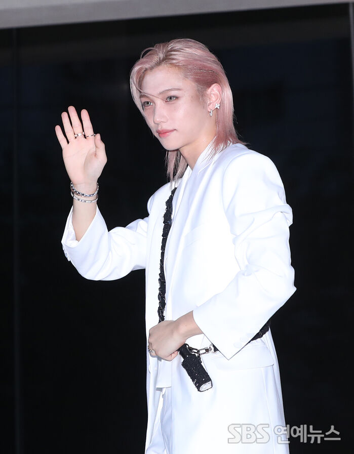 Stray Kids' FELIX Waves With a Smoldering Gaze at HAUS NOWHERE Seoul Opening