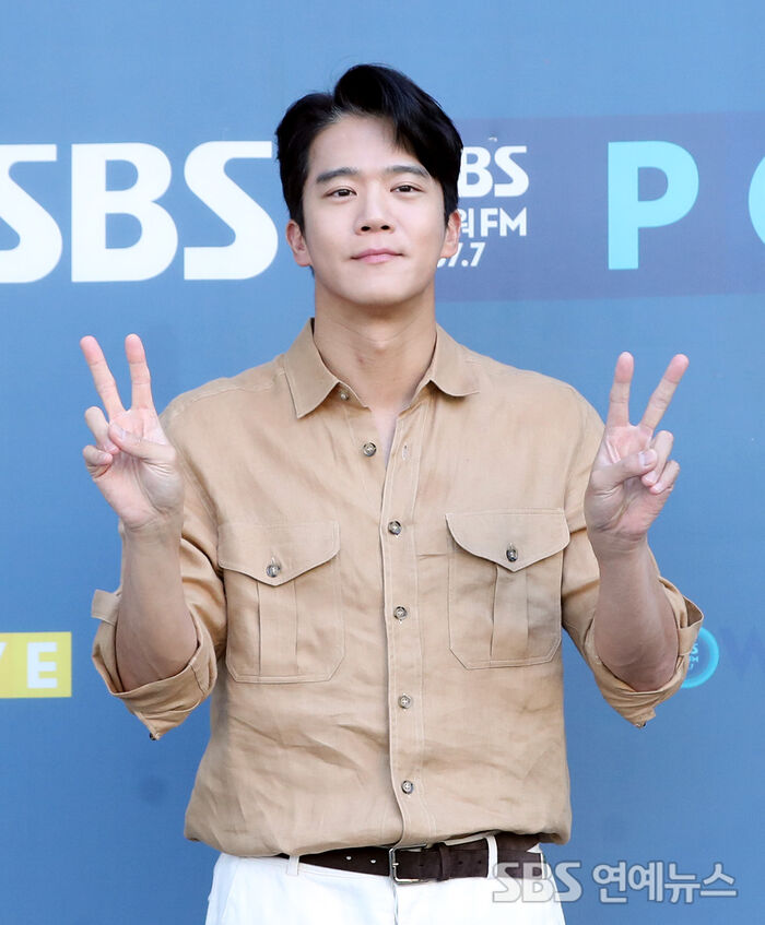 Ha Seok-jin Poses Outside SBS Headquarters