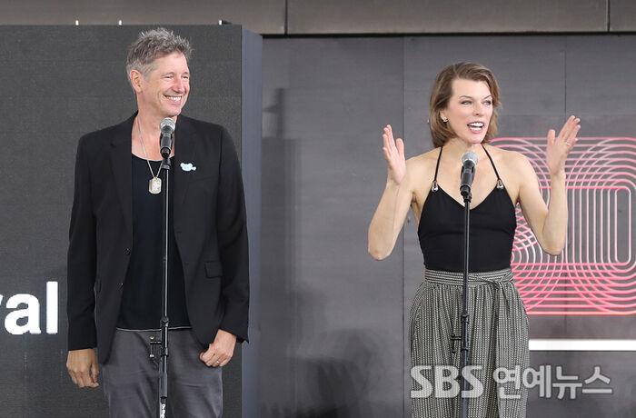 Milla Jovovich Hits BIFF With Husband Paul W.S. Anderson for "Protector"
