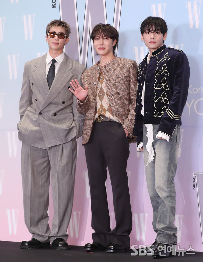 RM, J-Hope and V of BTS pose at Four Seasons Hotel Seoul