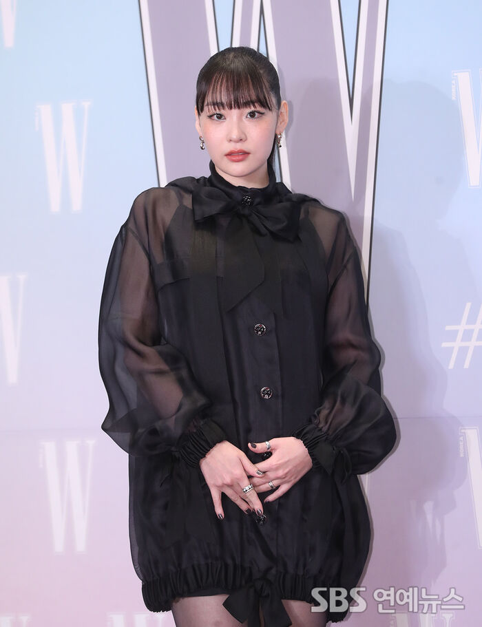 Minha Kim Stuns in Sleek, Chic Look at Breast Cancer Awareness Photo Call