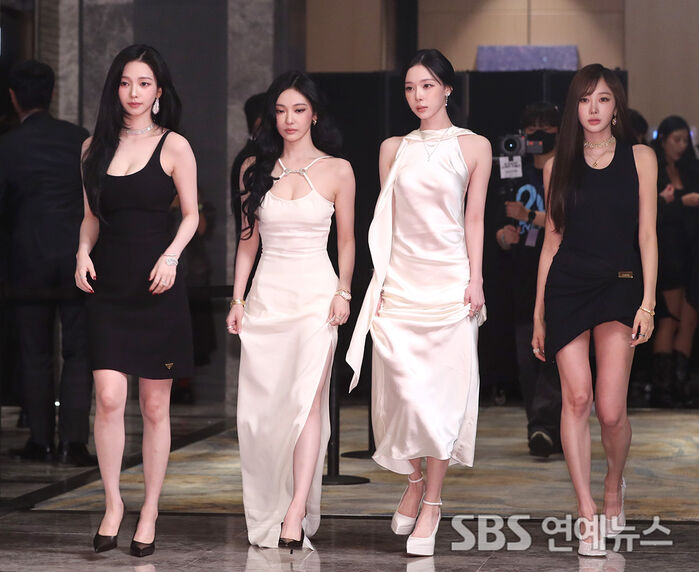 aespa Stuns in Sleek Black-and-White at Breast Cancer Awareness Event