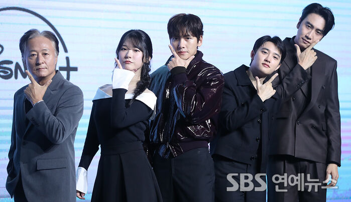 "The Manipulated" Stars Strike a Pose at Disney+ Press Event