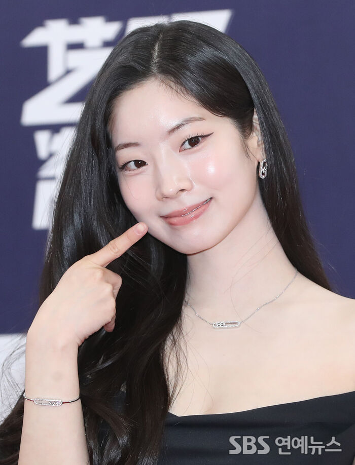 TWICE's DAHYUN Lights Up the Red Carpet With a Cheek-Pop Pose