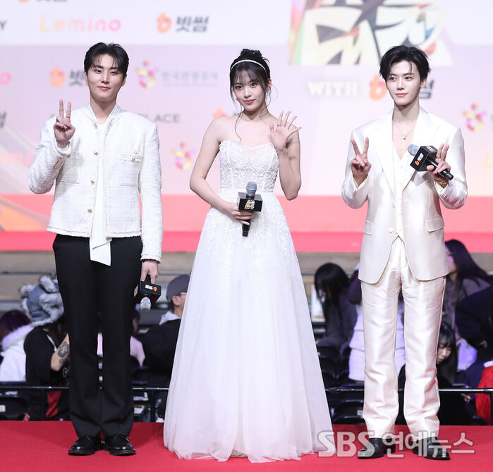 Young K, Ahn Yujin, and Jaemin at the 2025 SBS Music Awards red carpet