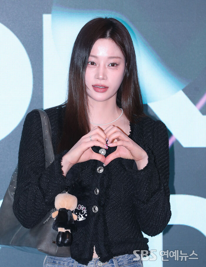 Kwon Arin Welcomes Spring With Heart Pose