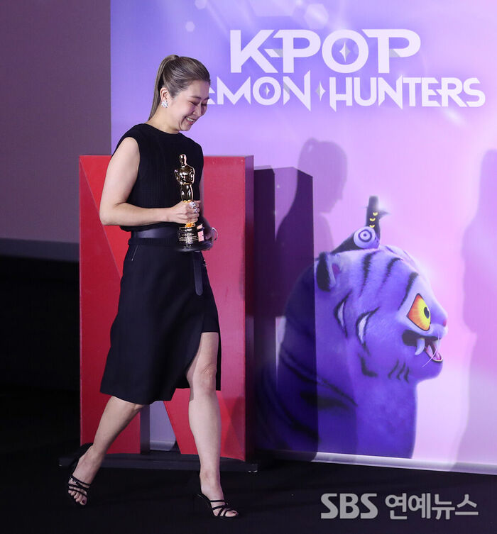 Director Maggie Kang