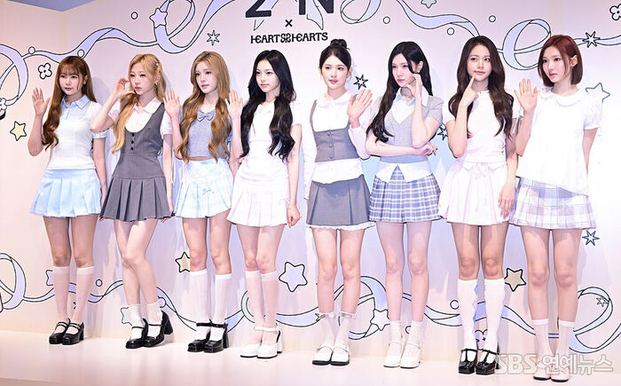 8 Members of Hearts2Hearts Light Up Beauty Brand's Photo Wall
