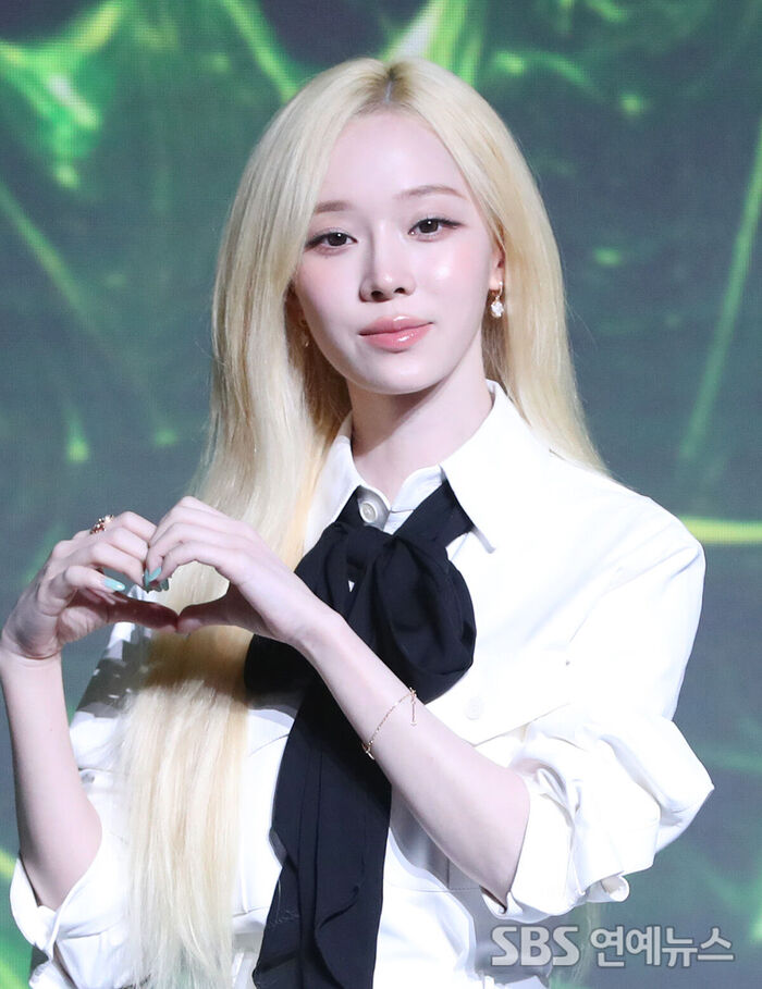 aespa's WINTER Delivers a Refreshing, Lemon-Infused Heart Pose