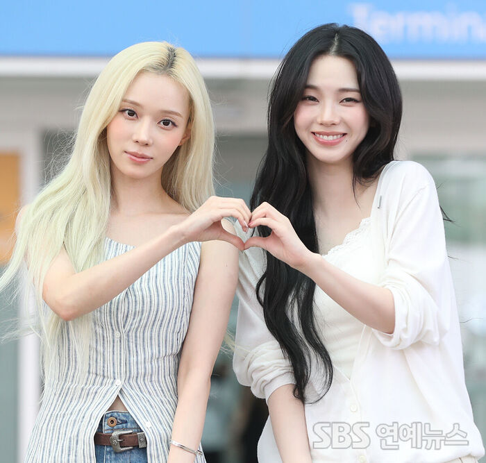 aespa's WINTER and KARINA Flash Hearts for Victory