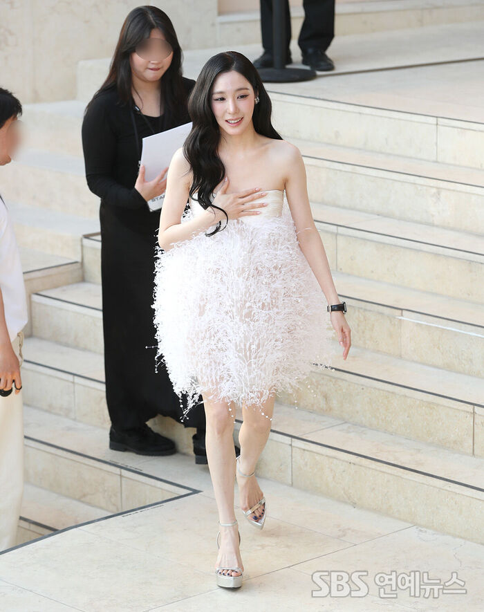 Tiffany Young Making a Dazzling Entrance like a Swan
