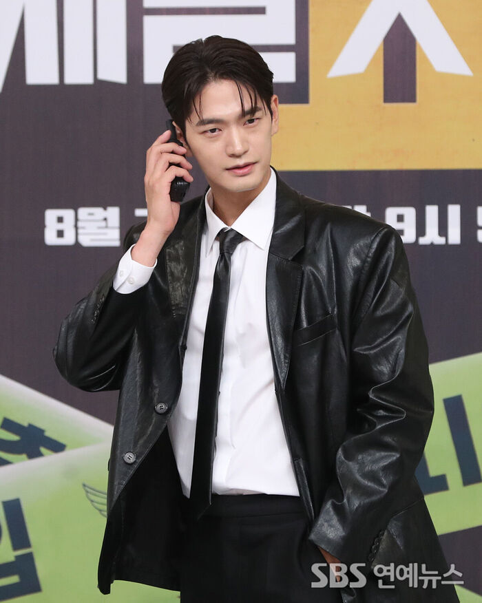 Kang Sang Jun Rocks a Leather Jacket for 'Flex X Cop 2' Press Conference
