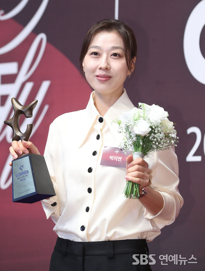 Park Ji-yeon Strikes a Pose at the 'Brand of the Year Awards' Photowall