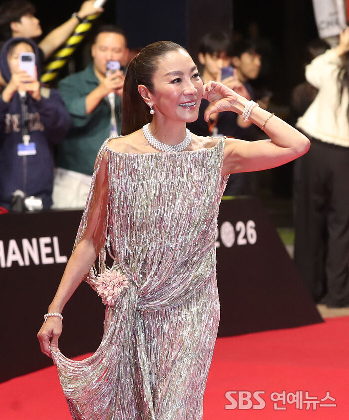 Michelle Yeoh Strikes an Elegant Heart Pose on the Red Carpet