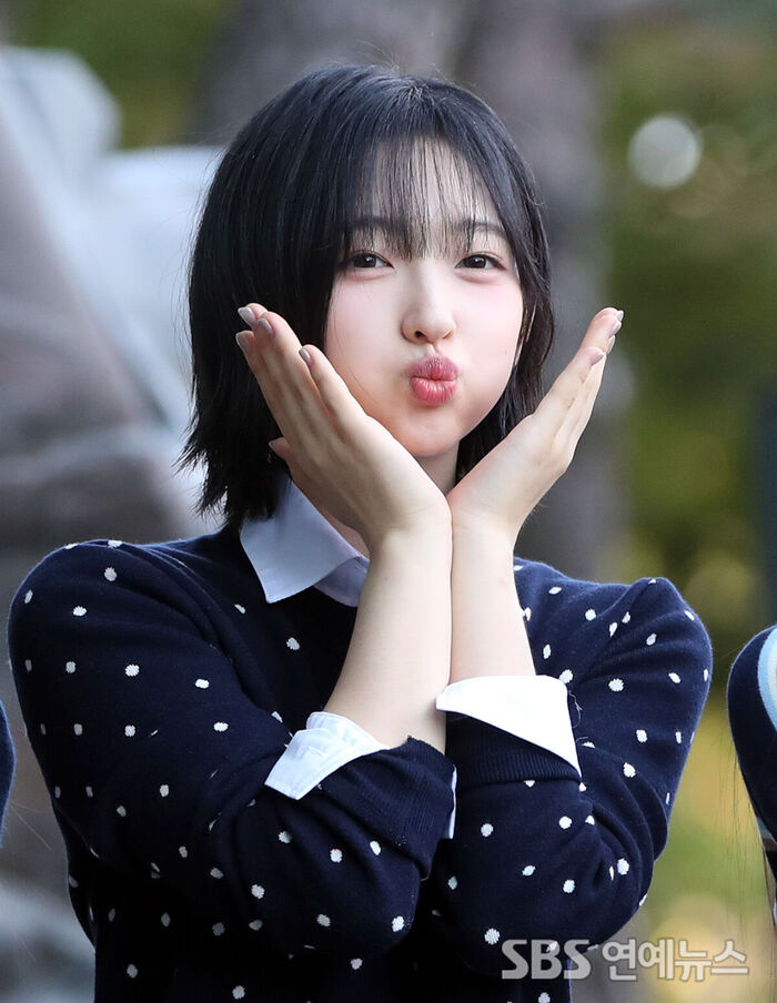 A2O LITE's VORA Poses With Puffy Cheeks and Cherry Lips