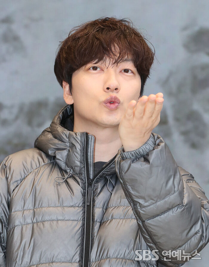 Lee Dong-hwi Melts the Chill With a Hand Kiss